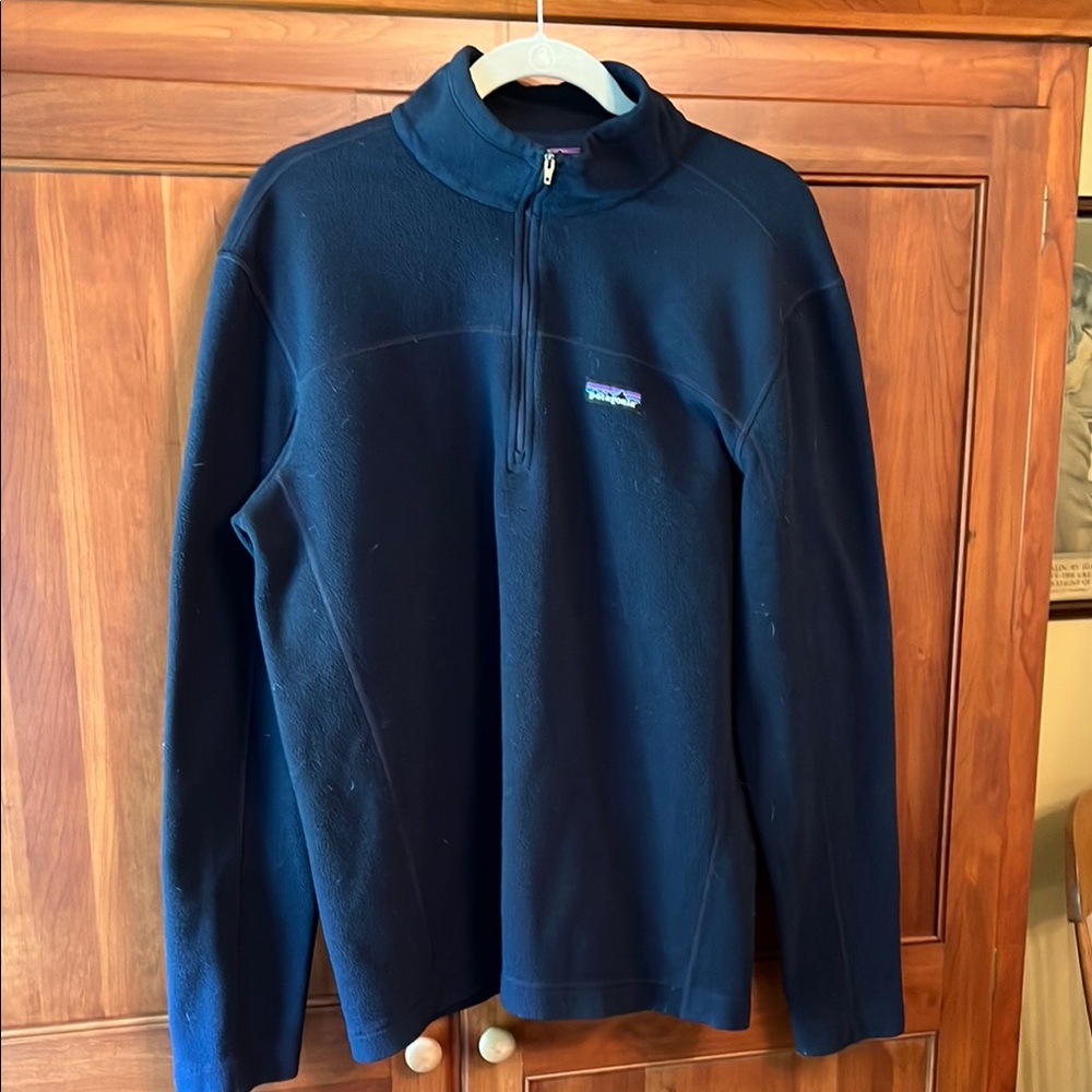 Patagonia Blue Zip Up Sweater with Minimalist Design